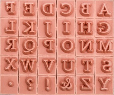 Background of rubber stamps of the English alphabetical clipart