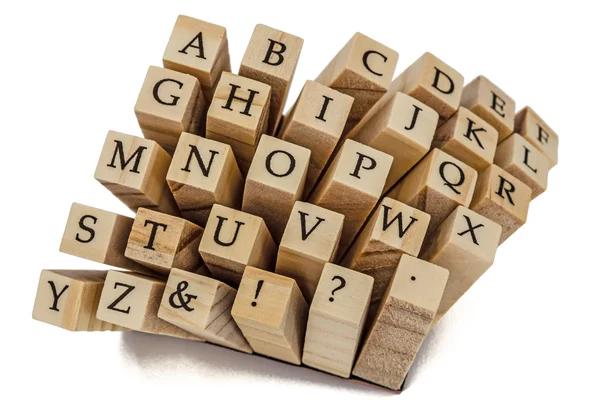 Letras del alfabeto inglés en los extremos de las barras de madera, isol —  Fotos de Stock
