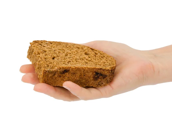 Female hand holds a slice of bread, isolated on white background — Stock Photo, Image