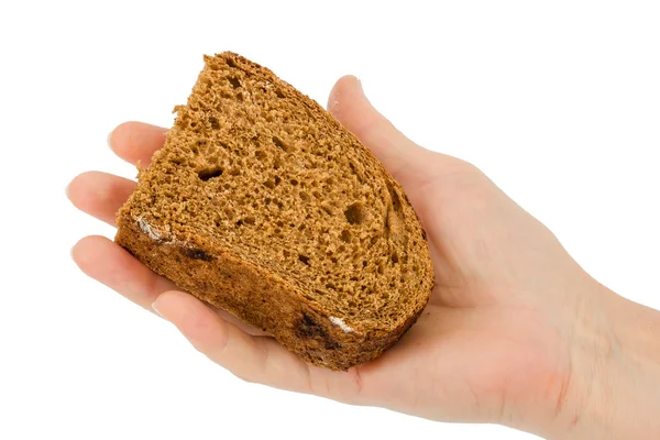 Mão feminina segura uma fatia de pão, isolado em fundo branco — Fotografia de Stock