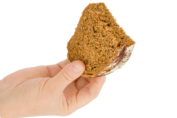 Female hand holds a slice of bread, isolated on white background — Stock Photo, Image