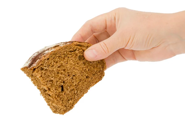 Female hand holds a slice of bread, isolated on white background — Stock Photo, Image