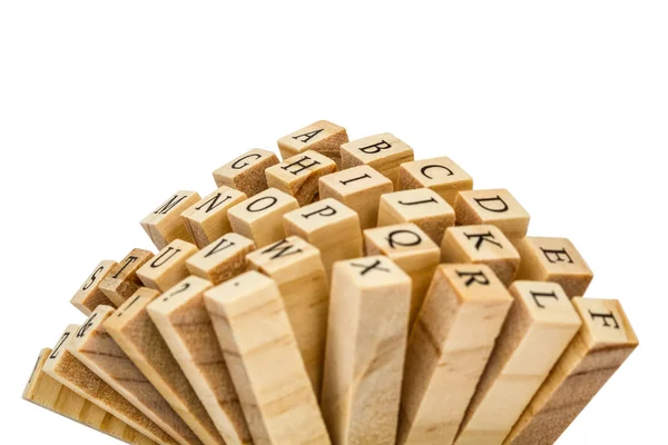 Letras do alfabeto inglês nas extremidades das barras de madeira, isol — Fotografia de Stock