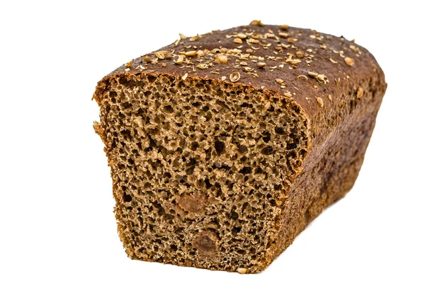 Cut in half a loaf of bread made of dark flour, isolated on whit — Stock Photo, Image