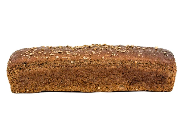 Loaf of bread made of dark flour, isolated on white background — Stock Photo, Image