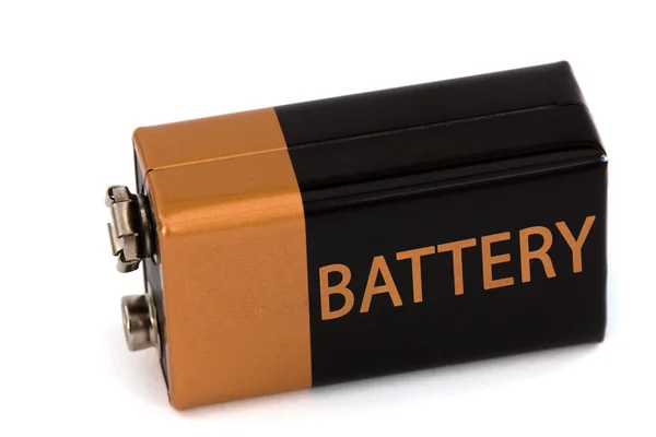 Una batteria quadrata, isolata su sfondo bianco — Foto Stock