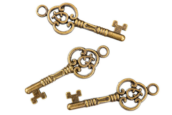 Set of bronze keys, decorative element for design, isolated on white background