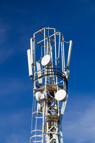 Cellular antennas on the top of the mast, close-up on a backgrou — Stock Photo, Image