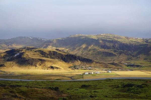 Area near Hveragerdi with mountains lit by the sun, South Iceland