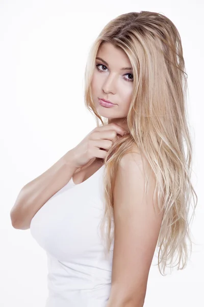 Jeune femme sexy mince en pull blanc isolé sur fond blanc — Photo