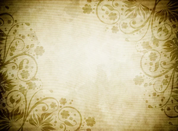 Gamla smutsiga papper bakgrund med blommiga mönster. — Stockfoto