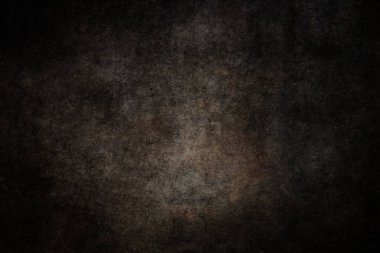 Çatlakları ve lekeleri olan esmer beton bir duvar. Doğal beton dokusu.