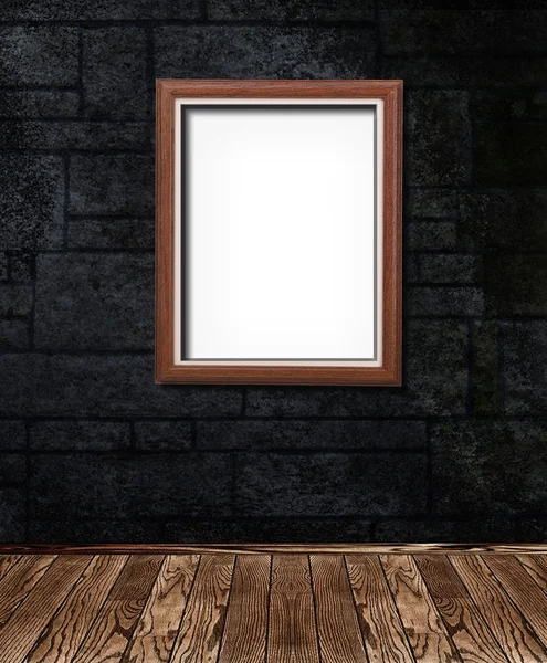 Wooden frame on the dark stone wall — Stock Photo, Image