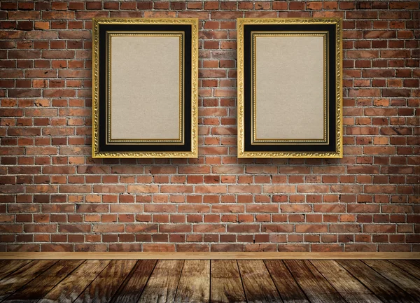 Vintage wooden frames on bricks wall. — Stock Photo, Image