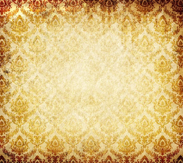 Old grunge paper background with vintage ornament. — Stock Photo, Image