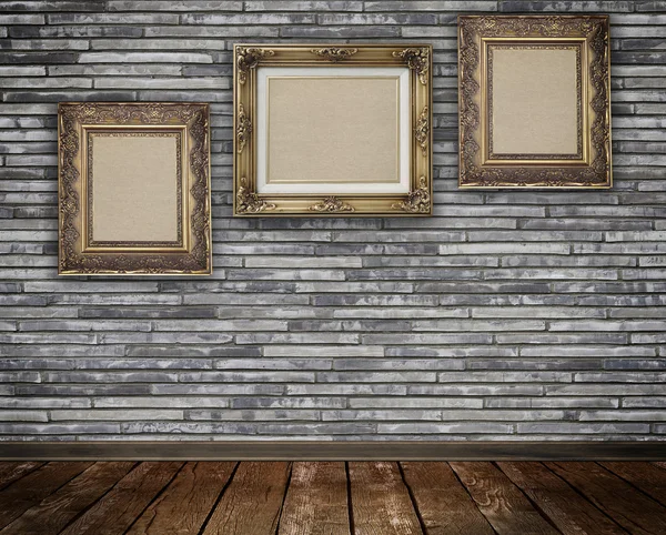 Old-fashioned wooden frame on a wall. — Stock Photo, Image