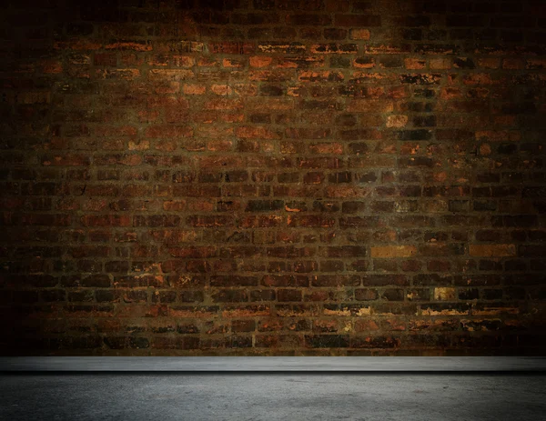 Old brick wall and concrete floor. — Stock fotografie