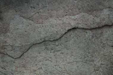 Old grunge concrete wall with crack. Concrete background for design.