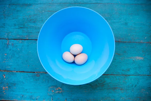 Easter - natural white eggs in a blue bowl — Stock Photo, Image