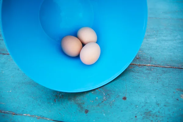 Easter - natural white eggs in a blue bowl — Stock Photo, Image