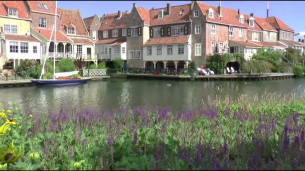 Old houses and a boat — Stock Video