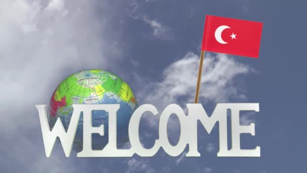 Turning globe and small paper flag of  TURKEY — Stock Video