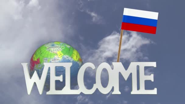 Globo giratorio y pequeña bandera de papel de la FEDERACIÓN RUSA — Vídeo de stock