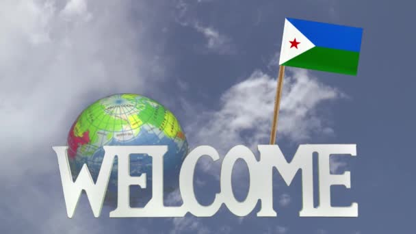 Globus drehen und kleine Papierfahne von Dschibuti — Stockvideo