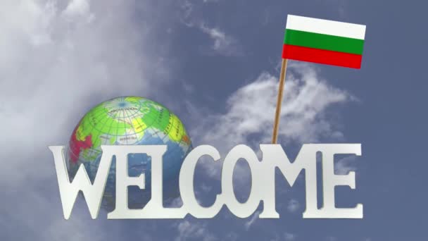 Turning globe and small paper flag of BULGARIA — Stock Video