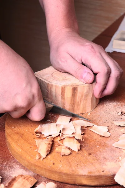 Carpenter hand carving wood — Stock Photo, Image