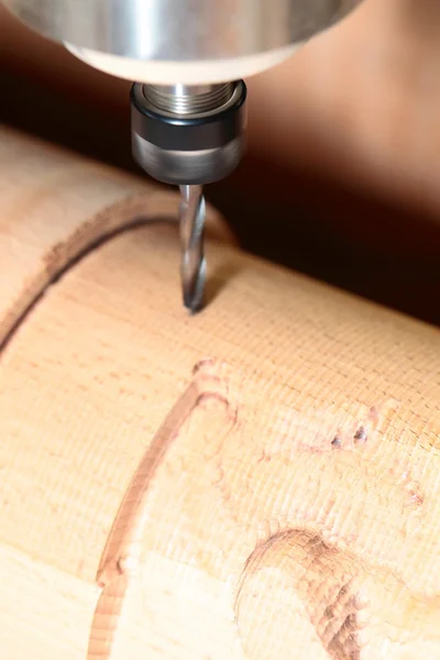 Machine is drilling wood — Stock Photo, Image