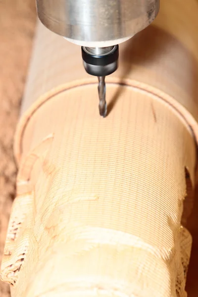 Machine is drilling wood — Stock Photo, Image