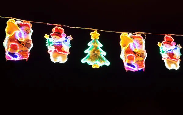 Street decorated with multicolor christmas lights — Stock Photo, Image