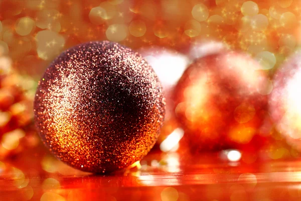 Golden christmas ball on abstract background — Stock Photo, Image