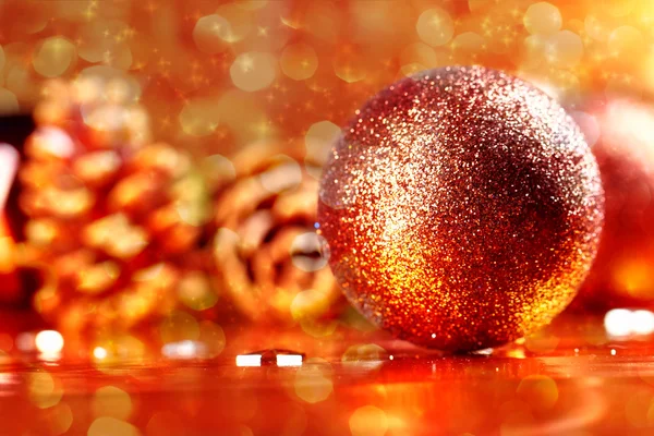 Golden christmas ball on abstract background — Stock Photo, Image