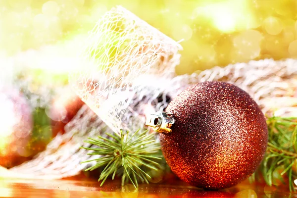 Golden christmas ball on abstract background — Stock Photo, Image