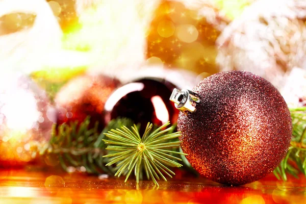 Golden christmas ball on abstract background — Stock Photo, Image