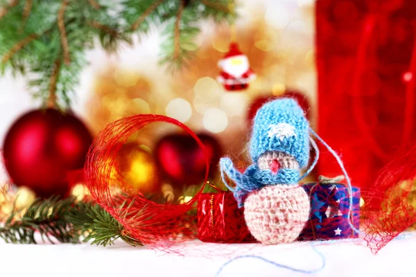 Little snowman and christmas decorations — Stock Photo, Image