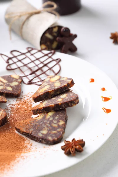 Salchicha de chocolate con decoraciones — Foto de Stock