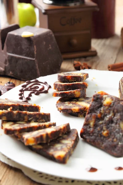 Chocolate sausage with decorations — Stock Photo, Image