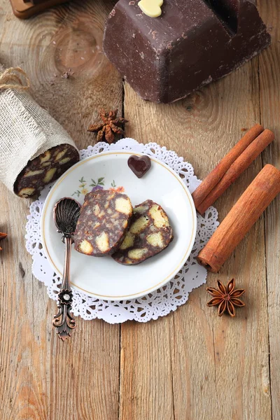 Chocolate sausage with decorations — Stock Photo, Image