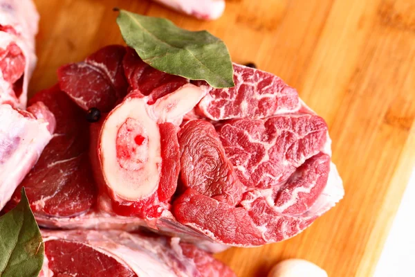 Raw meat with spices — Stock Photo, Image