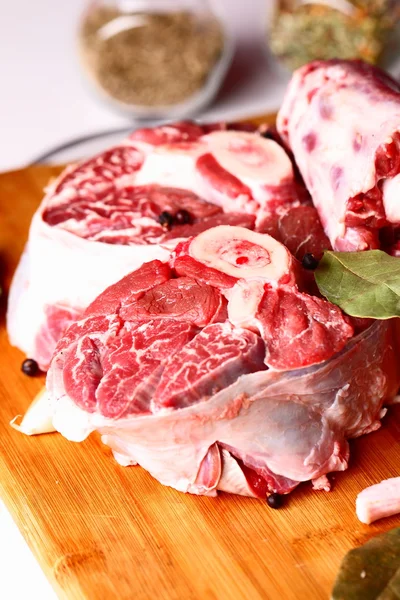 Raw meat with spices — Stock Photo, Image