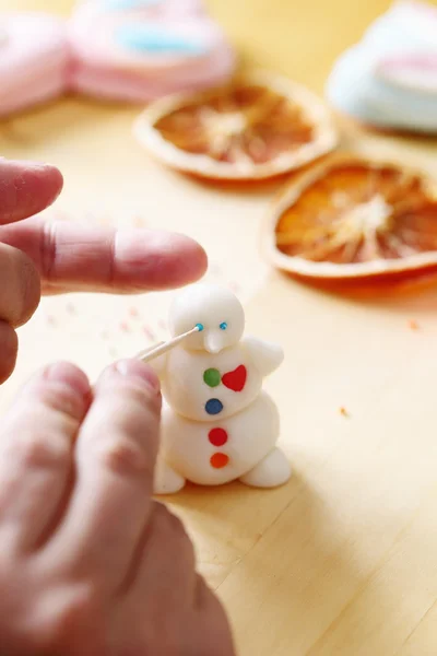 Making snowman from sugar mastic — Stock Photo, Image