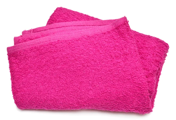 Розовое полотенце на белом — стоковое фото