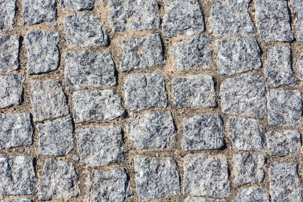 Cobbled road as background. — Stock Photo, Image