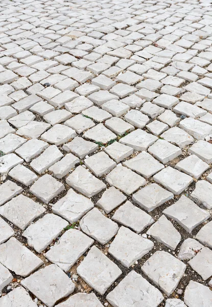 Cobbled road as background. — Stock Photo, Image