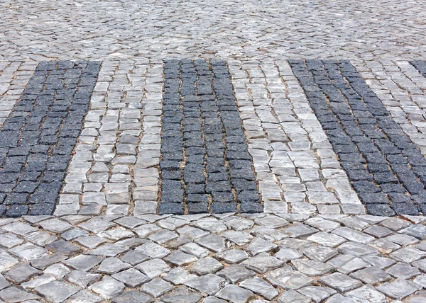 Cobbled road as background. — Stock Photo, Image