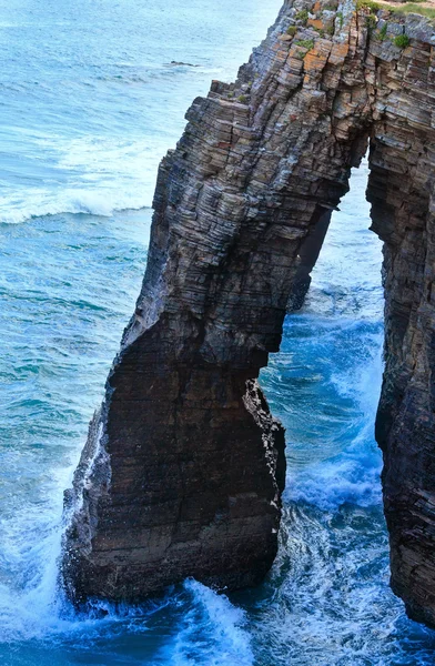 Natural arch on beach. — Stock Photo, Image