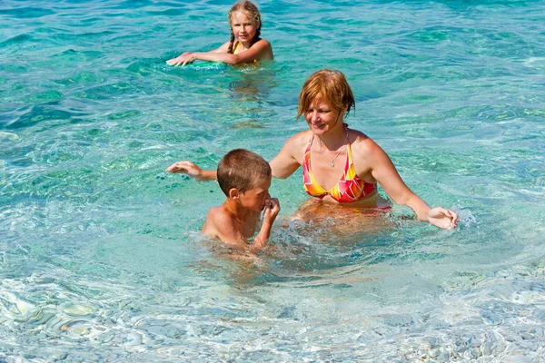 Familys summer holidays on sea (Greece). Royalty Free Stock Images